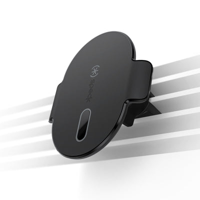 Three-quarter angled view of magnetic car mount attached to dimmed vents to illustrate product in use.#color_black