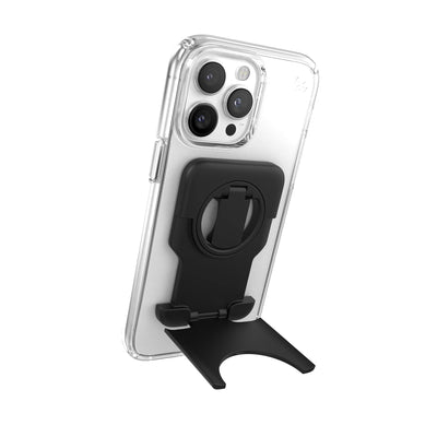 Three-quarter angled view of StandyGrip attached to a smartphone and holding it in portrait view stand formation.#color_black