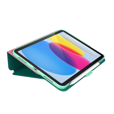 Three-quarter view of the front of the case, using typing stand formation.#color_ibis-pink-deep-malachite-jelly-mint