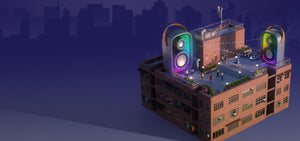 A building with people partying on the roof with giant GEMTONES Infinity Speakers by Speck providing the sound