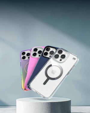 iPhone 16 phones are in various colors and designs of Speck cases and fanned out over a white pedestal