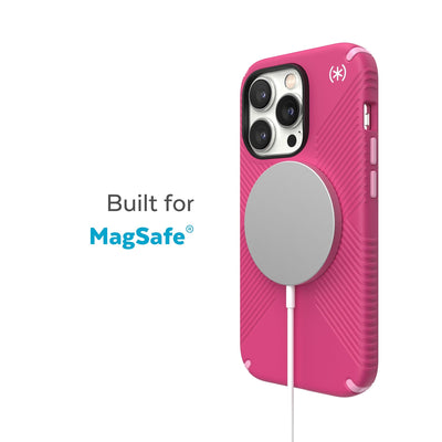 Three-quarter view of back of phone case with MagSafe charger attached - Built for MagSafe.#color_digital-pink-blossom-pink