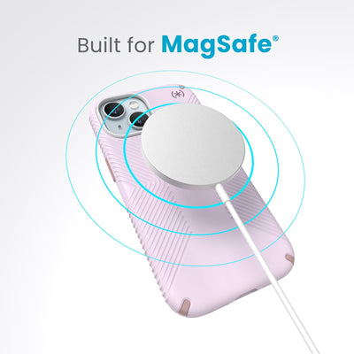 A case with phone inside with camera facing up and MagSafe wireless charger hovering above with concentric circles eminating from charger to signify power transfer. Text in image reads built for MagSafe.#color_soft-lilac-carnation-petal