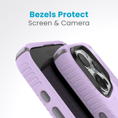 A case with phone inside with camera facing up is lying on top of a case with phone inside with screen facing up. Both are at a sharp angle clearly showing case's raised bezels around screen and camera. Text reads bezels protect screen and camera.#color_spring-purple-cloudy-grey