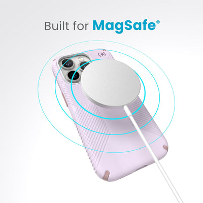 A case with phone inside with camera facing up and MagSafe wireless charger hovering above with concentric circles eminating from charger to signify power transfer. Text in image reads built for MagSafe.#color_soft-lilac-carnation-petal