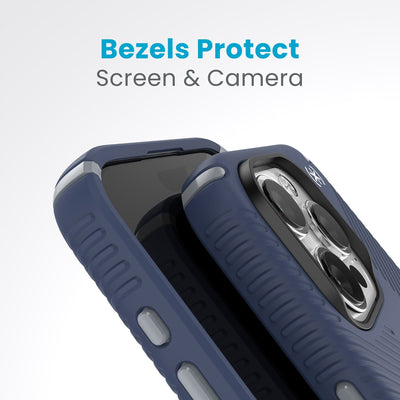 A case with phone inside with camera facing up is lying on top of a case with phone inside with screen facing up. Both are at a sharp angle clearly showing case's raised bezels around screen and camera. Text reads bezels protect screen and camera.#color_coastal-blue-dust-grey