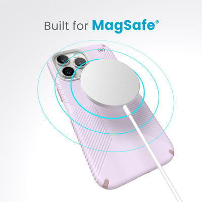 A case with phone inside with camera facing up and MagSafe wireless charger hovering above with concentric circles eminating from charger to signify power transfer. Text in image reads built for MagSafe.#color_soft-lilac-carnation-petal
