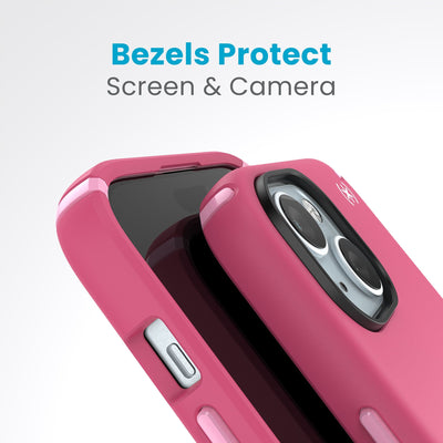 A case with phone inside with camera facing up is lying on top of a case with phone inside with screen facing up. Both are at a sharp angle clearly showing case's raised bezels around screen and camera. Text reads bezels protect screen and camera.#color_digital-pink-blossom-pink