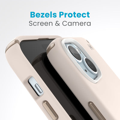 A case with phone inside with camera facing up is lying on top of a case with phone inside with screen facing up. Both are at a sharp angle clearly showing case's raised bezels around screen and camera. Text reads bezels protect screen and camera.#color_bleached-bone-heirloom-gold