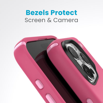 A case with phone inside with camera facing up is lying on top of a case with phone inside with screen facing up. Both are at a sharp angle clearly showing case's raised bezels around screen and camera. Text reads bezels protect screen and camera.#color_digital-pink-blossom-pink