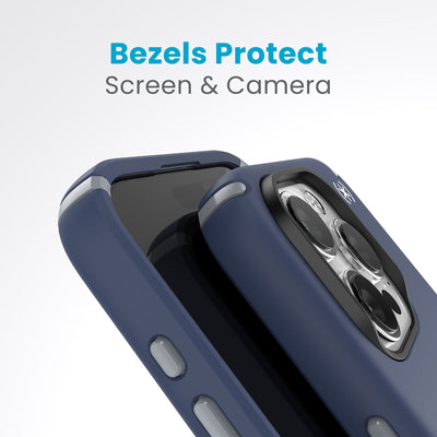 A case with phone inside with camera facing up is lying on top of a case with phone inside with screen facing up. Both are at a sharp angle clearly showing case's raised bezels around screen and camera. Text reads bezels protect screen and camera.#color_coastal-blue-dust-grey