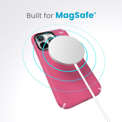 A case with phone inside with camera facing up and MagSafe wireless charger hovering above with concentric circles eminating from charger to signify power transfer. Text in image reads built for MagSafe.#color_digital-pink-blossom-pink