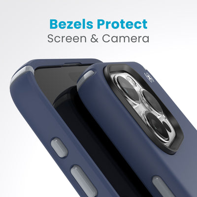 A case with phone inside with camera facing up is lying on top of a case with phone inside with screen facing up. Both are at a sharp angle clearly showing case's raised bezels around screen and camera. Text reads bezels protect screen and camera.#color_coastal-blue-dust-grey