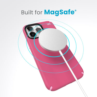 A case with phone inside with camera facing up and MagSafe wireless charger hovering above with concentric circles eminating from charger to signify power transfer. Text in image reads built for MagSafe.#color_digital-pink-blossom-pink