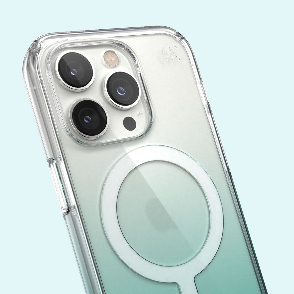 Three-quarter angle of iPhone 14 Pro MagSafe case in Clear/Fantasy Teal Ombre pattern