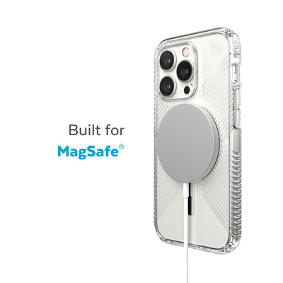 Three-quarter view of back of phone case with MagSafe charger attached - Built for MagSafe.#color_clear-silver