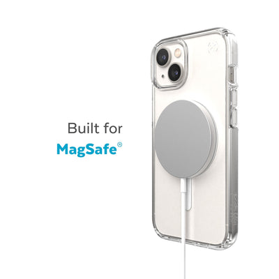 Three-quarter view of back of phone case with MagSafe charger attached - Built for MagSafe.#color_clear-white