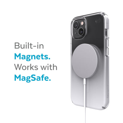 Three-quarter view of back of phone case with MagSafe charger attached - Built-in magnets. Works with MagSafe.#color_clear-atmosphere-fade
