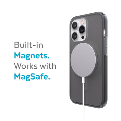 Three-quarter view of back of phone case with MagSafe charger attached - Built-in magnets. Works with MagSafe.#color_obsidian