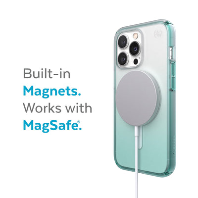 Three-quarter view of back of phone case with MagSafe charger attached - Built-in magnets. Works with MagSafe.#color_arctic-teal-fade