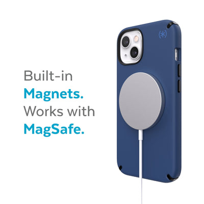 Three-quarter view of back of phone case with MagSafe charger attached - Built-in magnets. Works with MagSafe.#color_coastal-blue-black-storm-blue