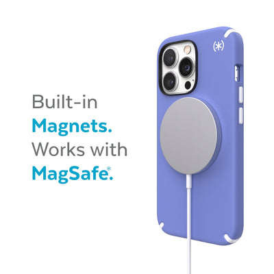 Three-quarter view of back of phone case with MagSafe charger attached - Built-in magnets. Works with MagSafe.#color_grounded-purple-white