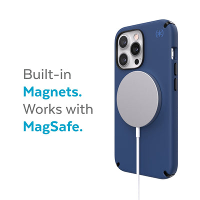 Three-quarter view of back of phone case with MagSafe charger attached - Built-in magnets. Works with MagSafe.#color_coastal-blue-black-storm-blue