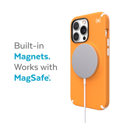 Three-quarter view of back of phone case with MagSafe charger attached - Built-in magnets. Works with MagSafe.#color_uplift-orange-white