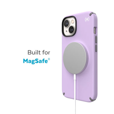 Three-quarter view of back of phone case with MagSafe charger attached - Built for MagSafe.#color_spring-purple-cloudy-grey-white