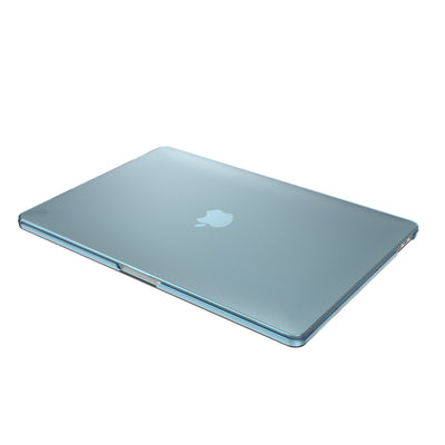 Three-quarter view of the front of the MacBook with the laptop closed.